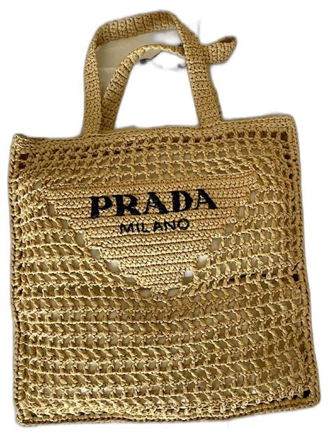 fake prada straw bag|prada beach bag price list.